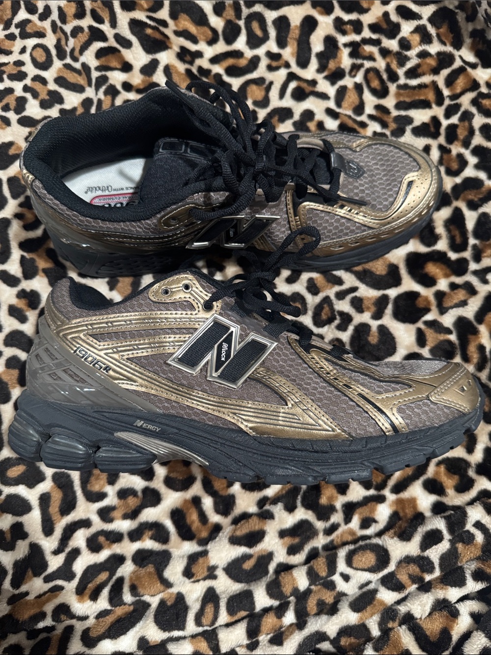 New Balance Women’s Black and Metallic Gold Athletic Running Shoes